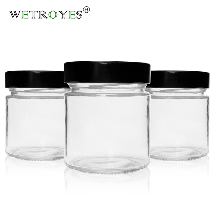 China Ergo Glass Food Jar Sauce Container with Metal Lid factory and  manufacturers