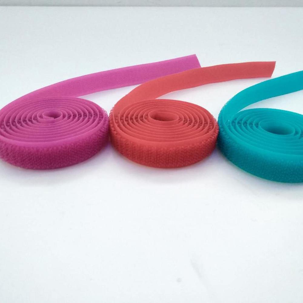 rullevævet taljehånd fremstiller selvklæbende selvklæbende krog-og-løkke-tape med præget logo