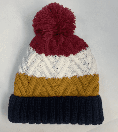 boy’s  multicolor knitted hat with pompom and polar fleece lining