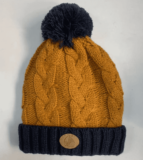 boy’s cable knitted hat with pompom,polar fleece lining,remove front patch