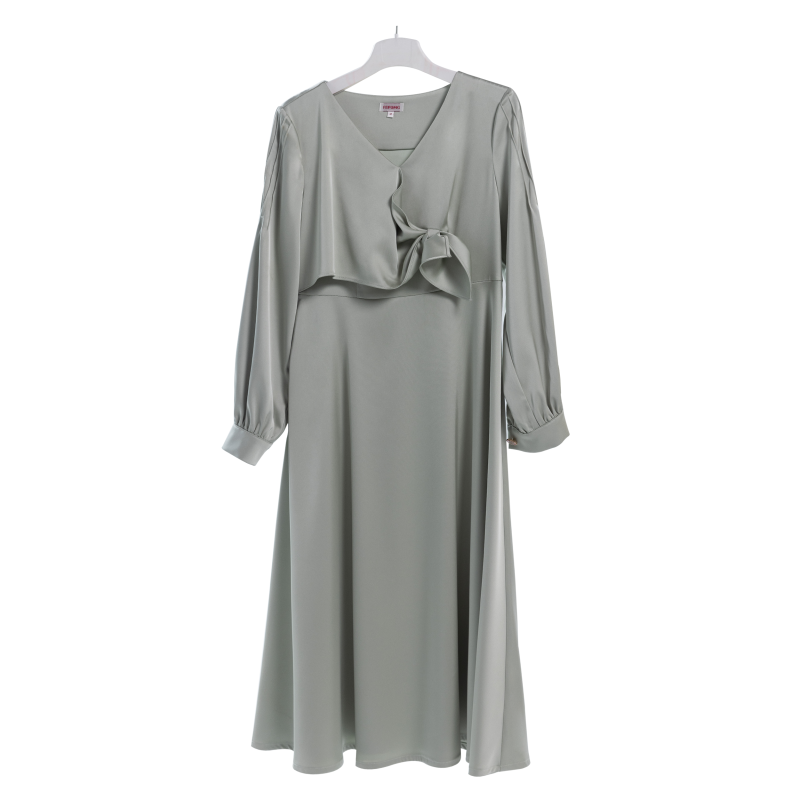 A satin dress with a cross on the front