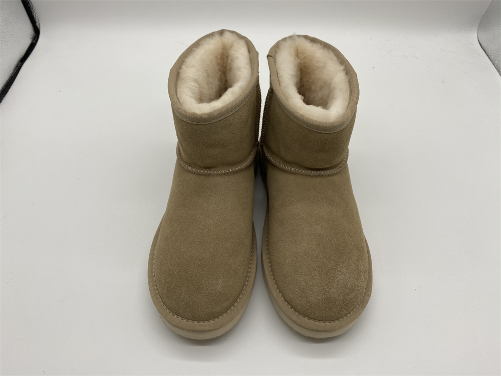 Lady Sheepskin Mini boot mei EVA sole Featured Image