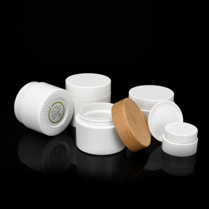 15ml 30ml 50ml 100ml Tarro de crema blanca Biodegradable PLA Tarro de crema Bomba de loción en aerosol Contenedor cosmético con tapa de bambú