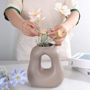 Fabrikant Hoogwaardige moderne decoratieve keramische ronde buis vloeibare creatieve vaas