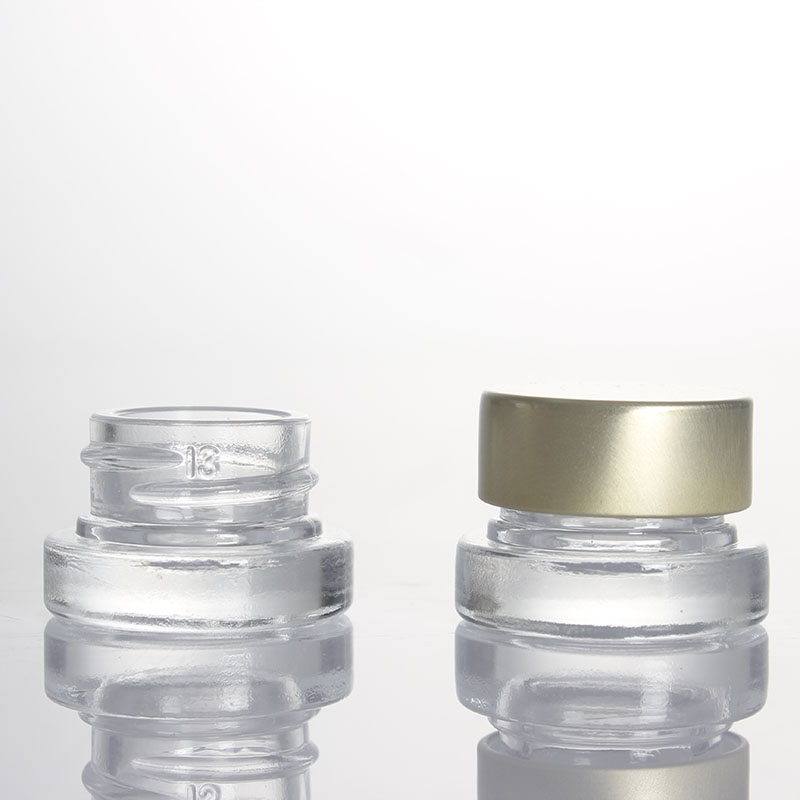 China wholesale 5ml empty eye cream jar Facial cream glass jar logo customized cosmetics makeup Featured Image
