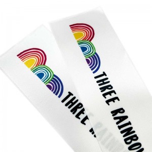Etiquetes teixides de disseny personalitzat amb estampats multicolors