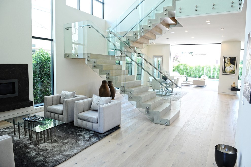 outdoor-spiral-staircase-Living-Room-Contemporary-with-double-height-glass-panel-railing-gray-area