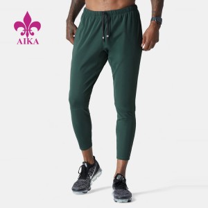 Factory Price Wholesale Lightweight Custom Logo Nylon Slim Fit Gym Jogger Pants For Men
