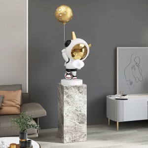Marble base spaceman statues