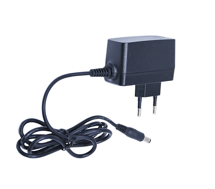 Universal Switching Power Adapter ,  9 Volt 600MA Power Supply Wall Plug
