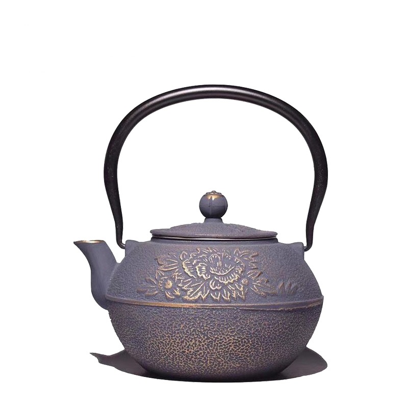 Cast iron teapot with flower design Featured Image
