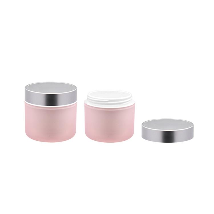 frosted plastic pink cosmetic cream jar with silver lid