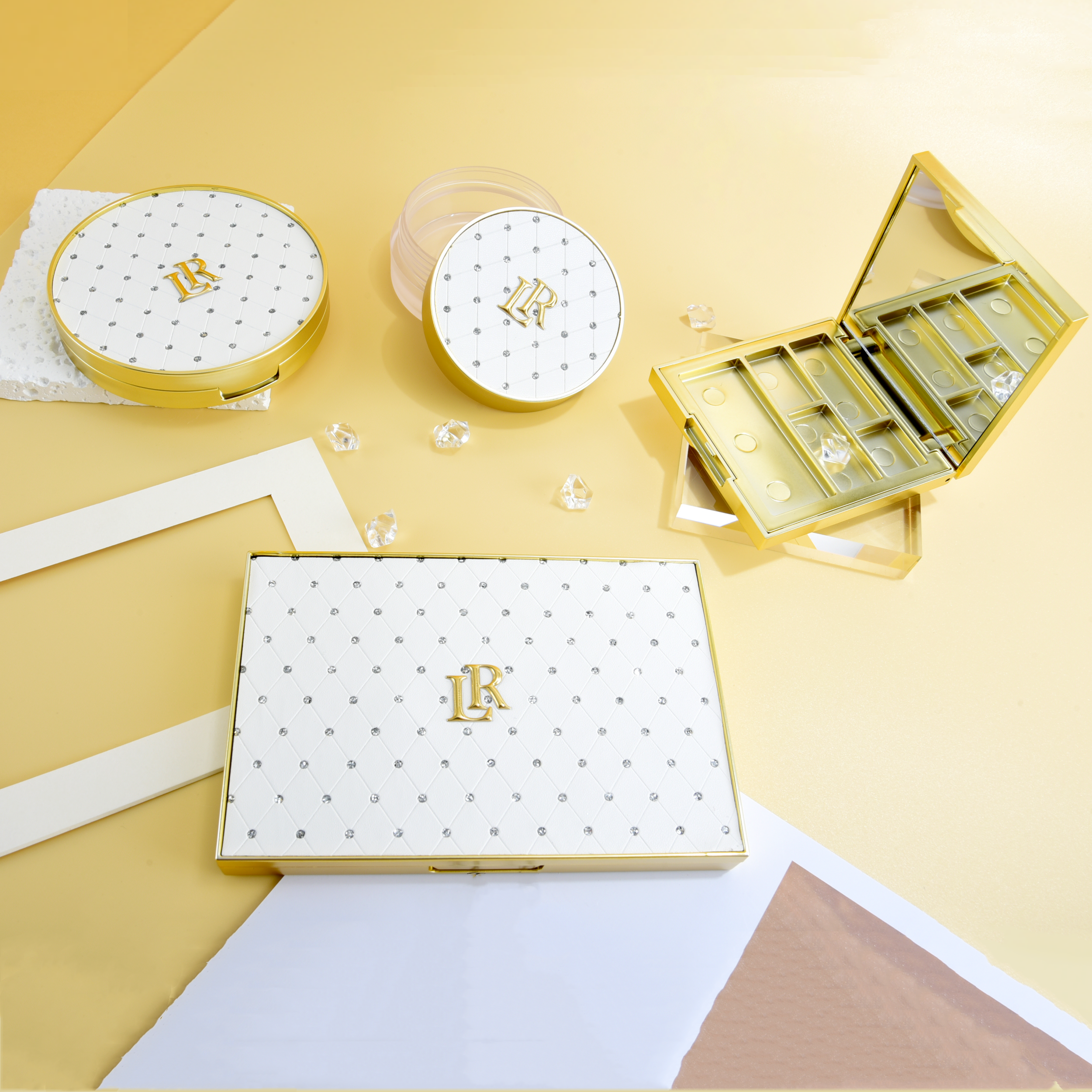 white and gold luxury cosmetic packaging sets with diamonds leather top