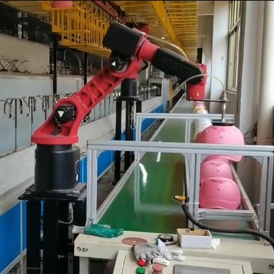 What is the function of an automatic spraying robot?