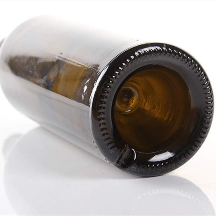 Why do many glass bottles have a “concave bottom” at the bottom?