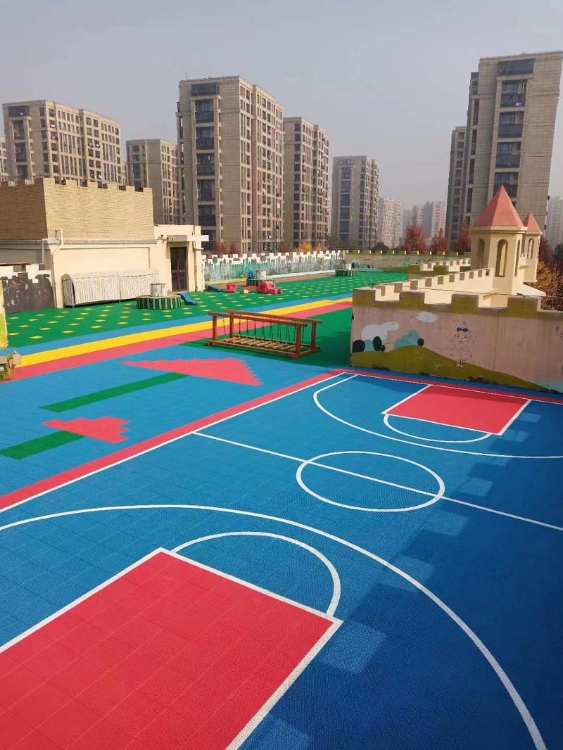 What is the best surface type for an outdoor basketball court?