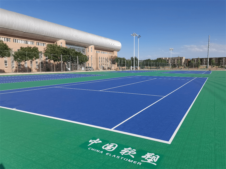 Is it better to install PVC sheet flooring or modular interlocking floor tile for outdoor badminton courts?