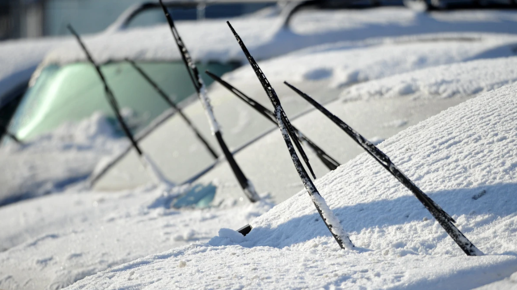 Why putting your windshield wipers up in winter may do more harm than good?