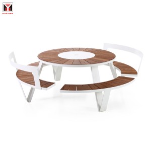 Vonkajší okrúhly piknikový stôl s moderným dizajnom a lavičkami, mestský pouličný nábytok