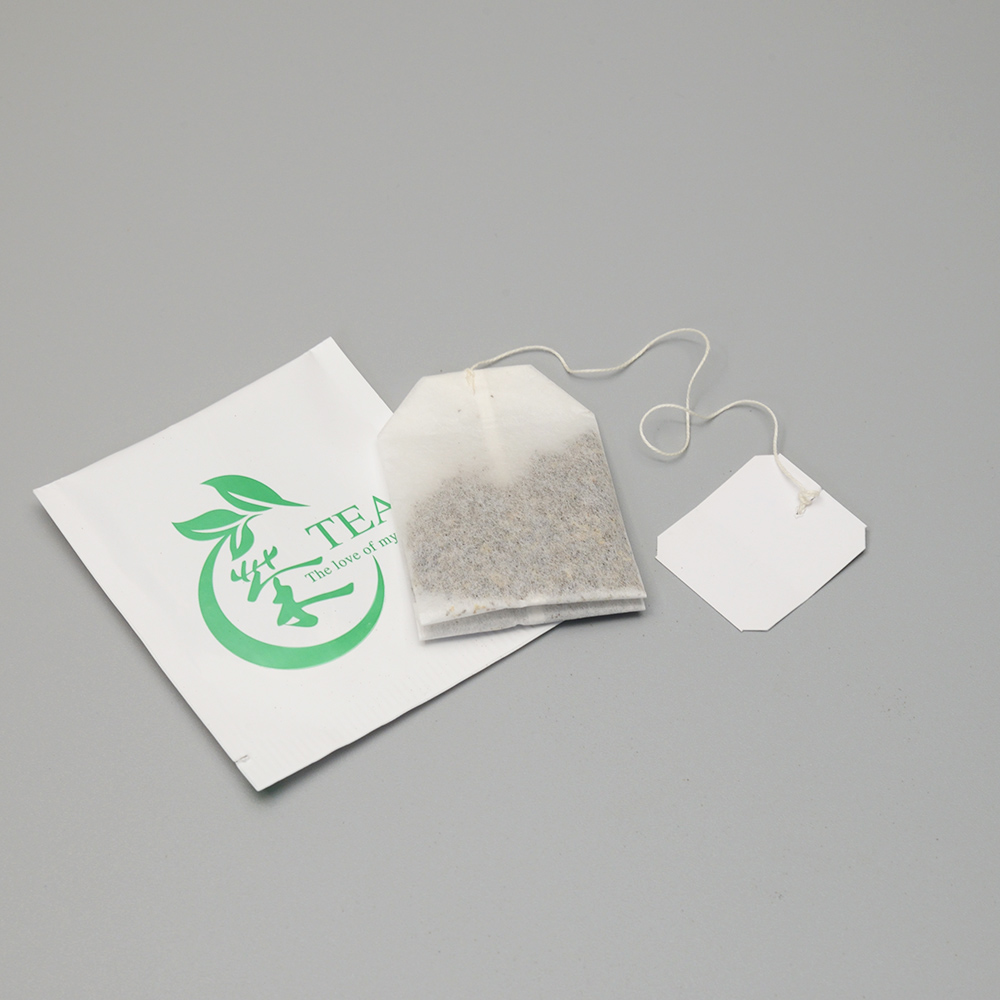 Filtračný papier s hmotnosťou 16,5 g/m2 vyrobený z PLA a drevnej buničiny z továrne na tepelné tesnenie filtračného vrecka na čajové vrecúška