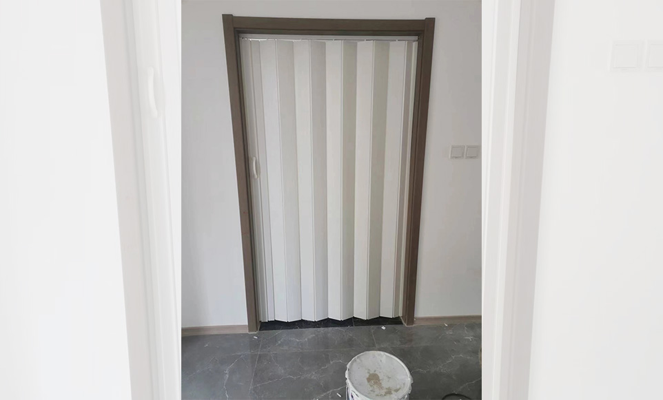 We should install PVC folding doors in the kitchen instead of sliding doors