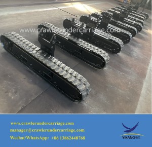 Hvidt ikke-mærkende gummibaneundervogn til lift læsseplatform / kran / edderkoppelift tilpasset af Kina Yijiang