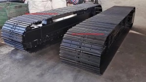 Kualitas luhur Steel lagu undercarriage kalawan motor hidrolik pikeun pangeboran geger crusher mobile produsén Cina