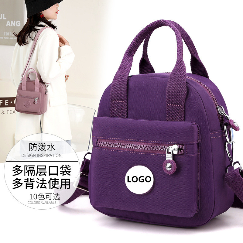 ປ້າຍສ່ວນຕົວນັກທ່ອງທ່ຽວ Handbag ແລະຫນ້າທີ່