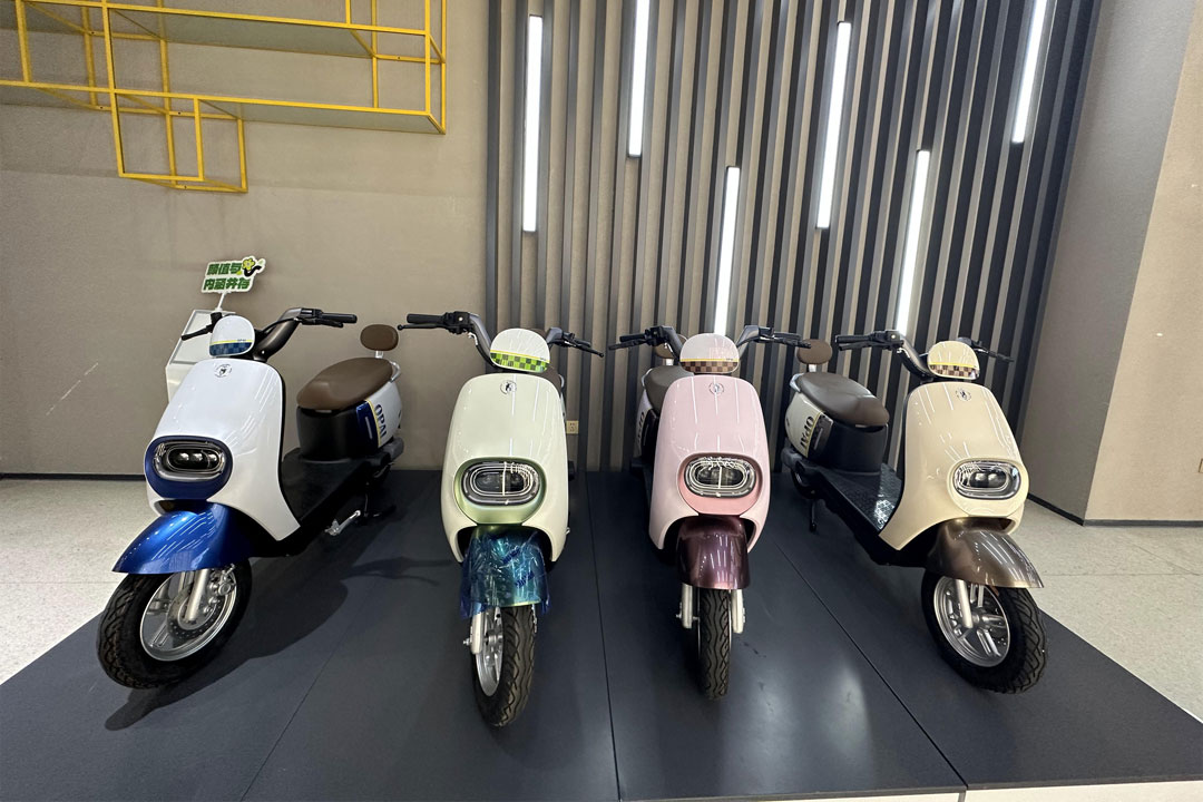 The Green Wave of Electric Mopeds: ແນວໂນ້ມ ແລະການພັດທະນາ