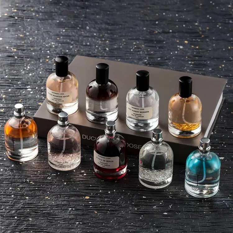Luxury 50ml Empty Round Cylinder Perfume Spray Glass Bottle With Black Cap