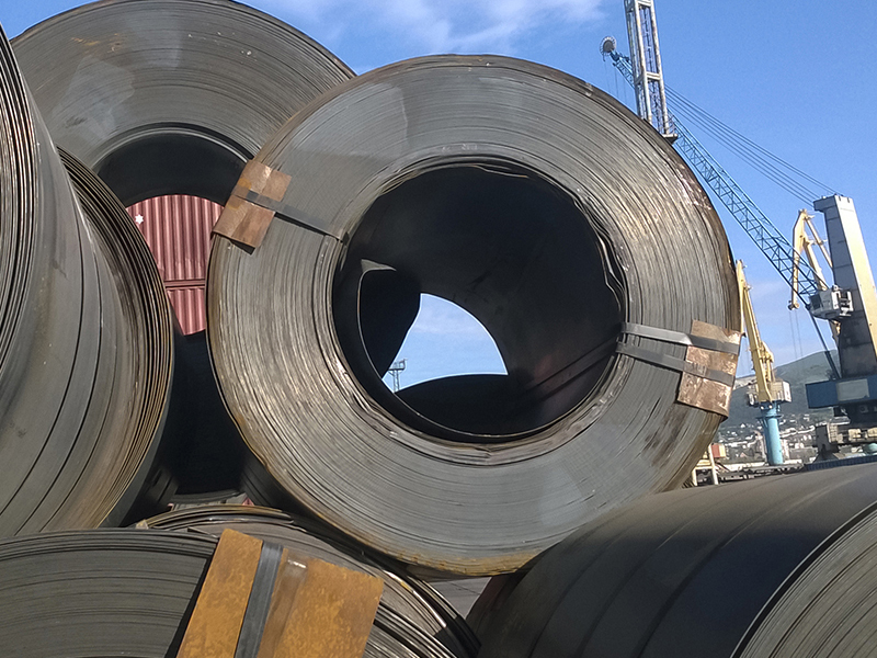 Steel sheets rolled up into rolls. Export Steel. Packing of steel for transportation