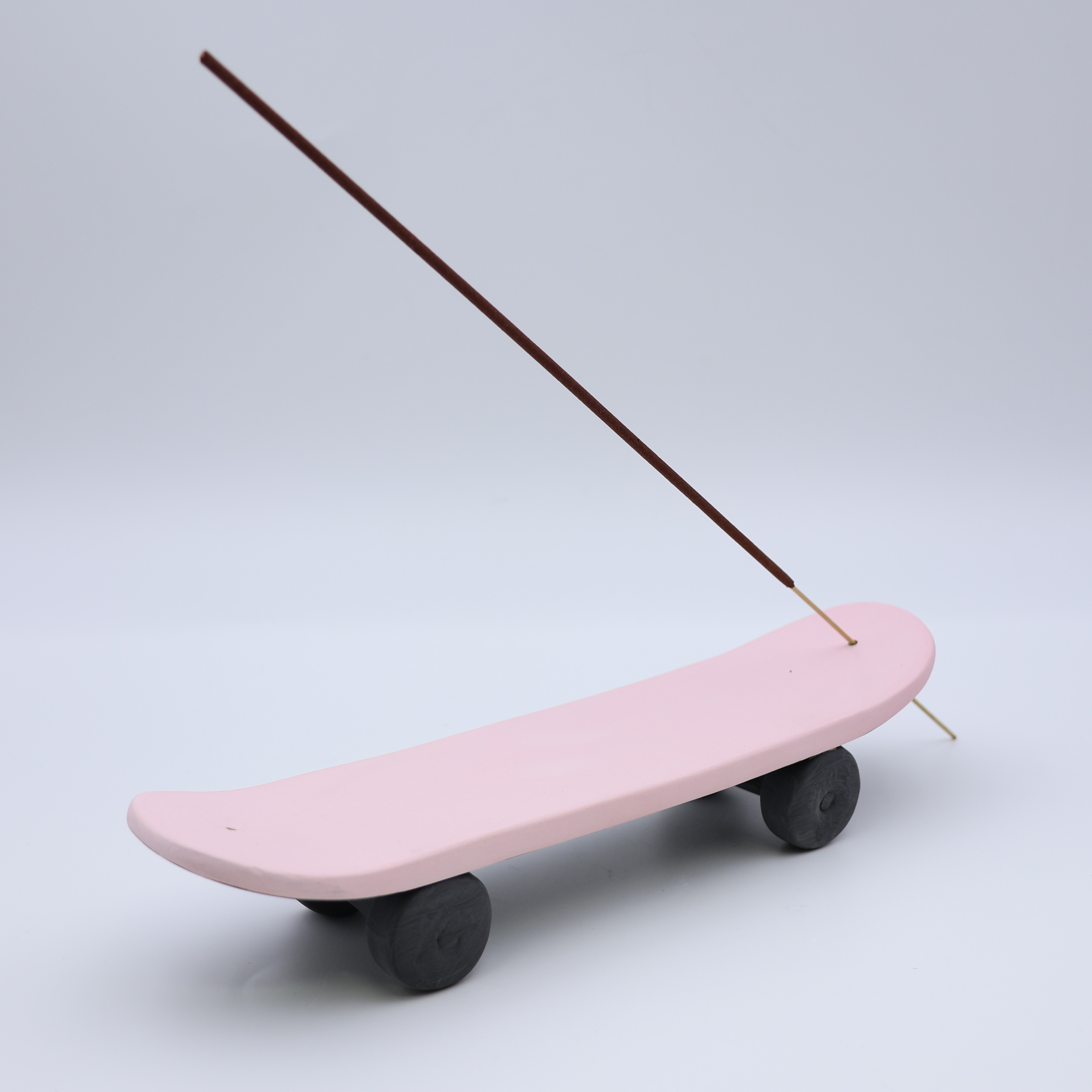 सिरेमिक स्केटबोर्ड धूप धारक गुलाबी