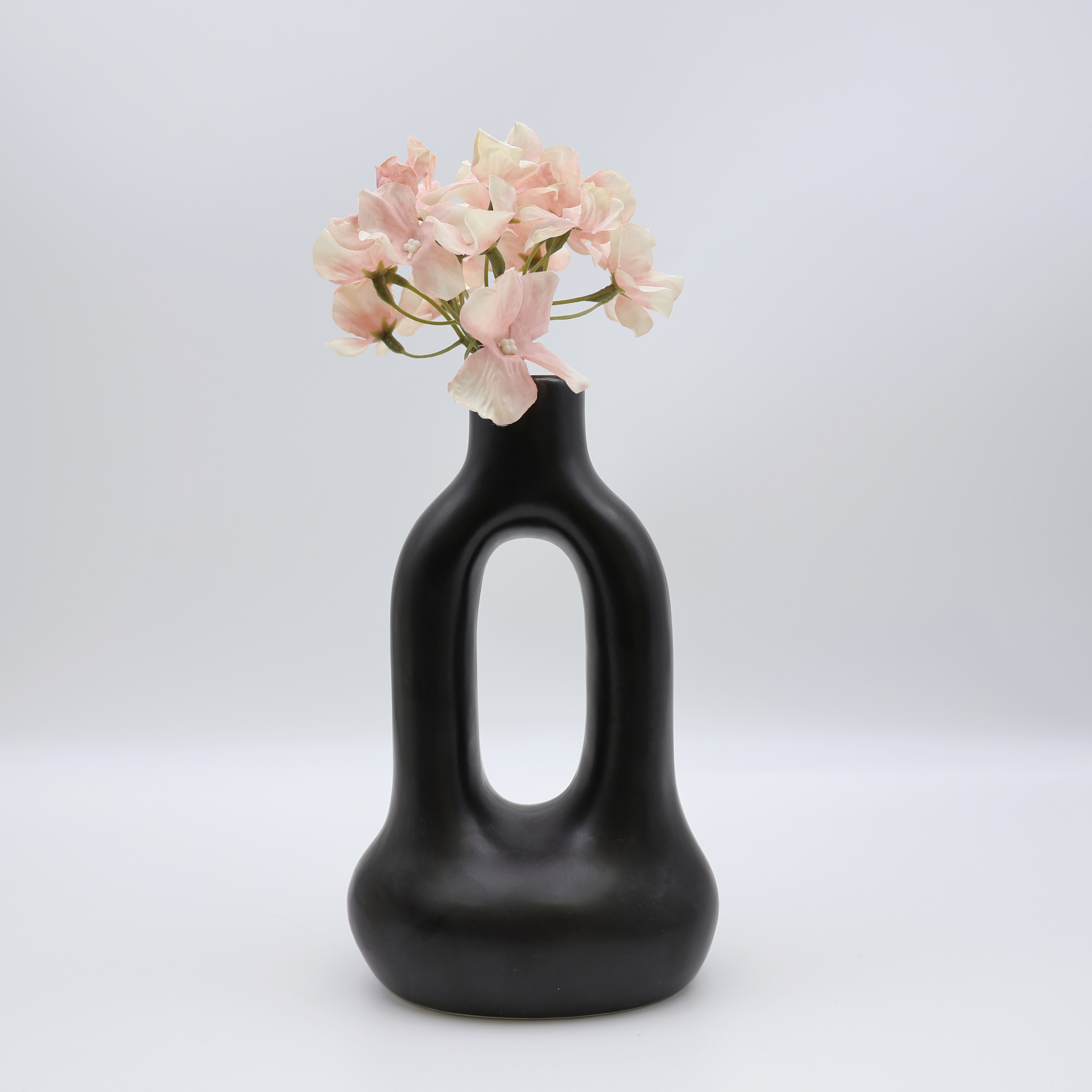 Vase à fleurs en forme de beignet en céramique noir