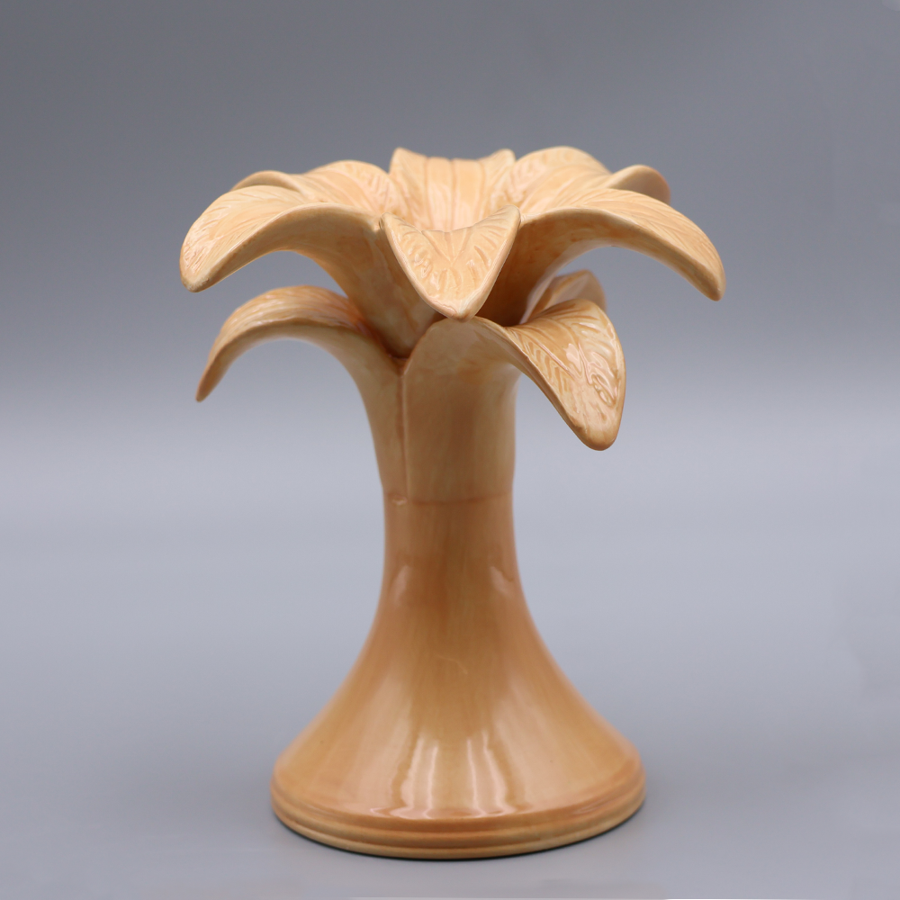 Ceramiczny świecznik w kształcie palmy pomarańczowy