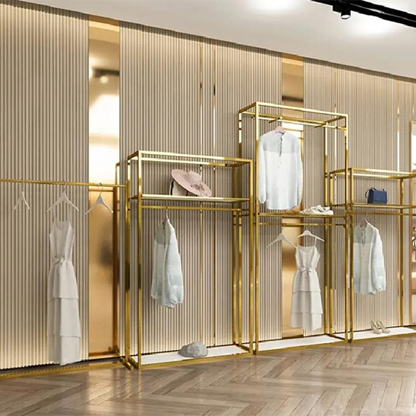 Commercieel kledingrek Gouden buisklerenrek Roestvrij stalen wandgemonteerde displayrekken