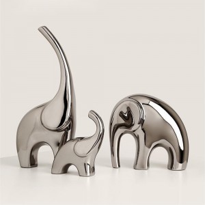 Família d'elefants d'acer inoxidable: decoració interior elegant