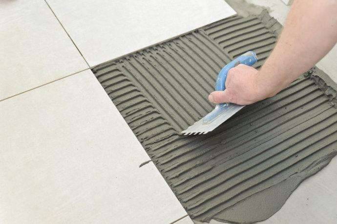 Tile laying systems