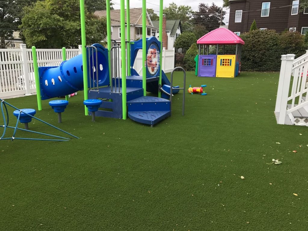 Is Artificial Grass for Playground Surfaces Safe for Kids and Pets?