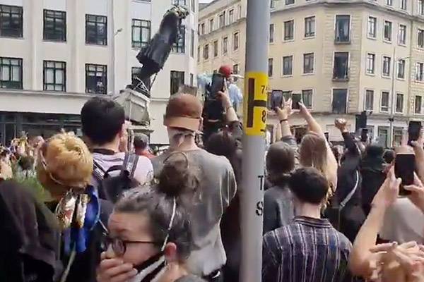 UK protesters pull down statue of 17th-century slave trader in Bristol