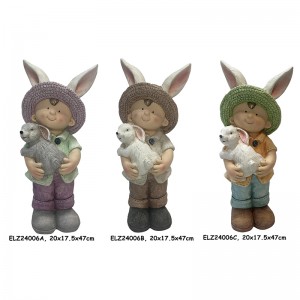 Aiakaunistused Bunny Buddies Collection Poiss ja tüdruk, kes hoiab jänest kevadist kodu ja aeda