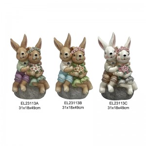 Figurines de conills dempeus i conills asseguts fetes a mà. Decoració de la temporada de primavera Decoració de jardí i llar