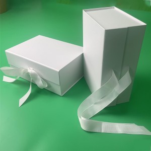 White folding gift box with ribbon bow for coffee packs packaging