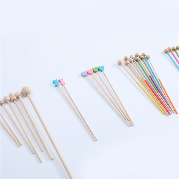 Birch dowel candy sticks plain or with balls or heart ornament Featured Image