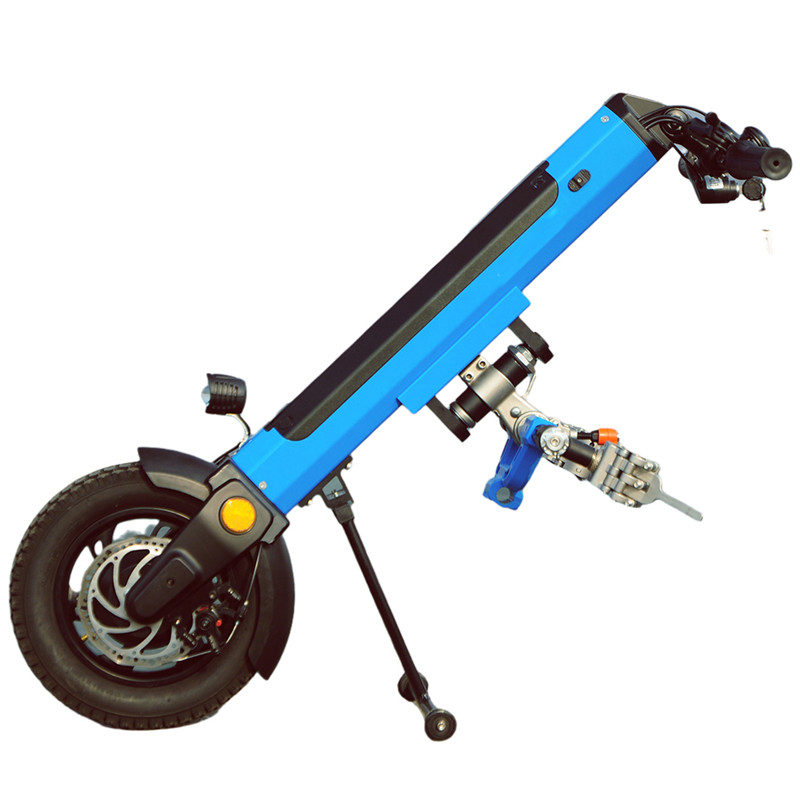 Front motor for manual wheelchair driving Featured Image
