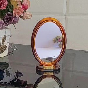 Plastic double-sided tan makeup mirror