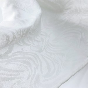 Soft silky solid fabric with dark pattern