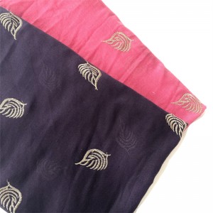 The whole scarf is embroidered, rich and characteristic