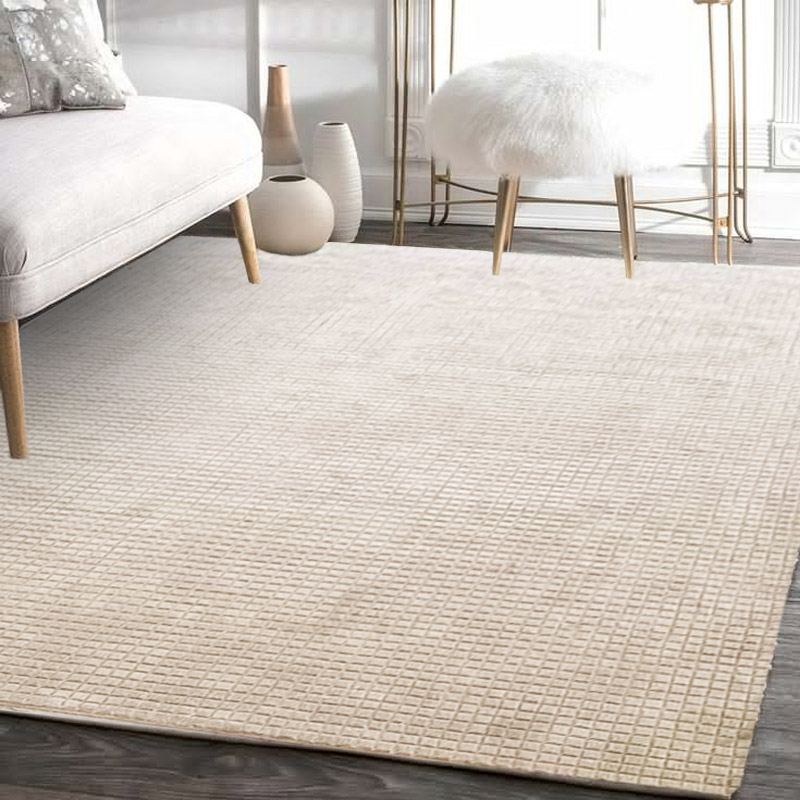 Luxusní 100 vlněný koberec krémové barvy do ložnice