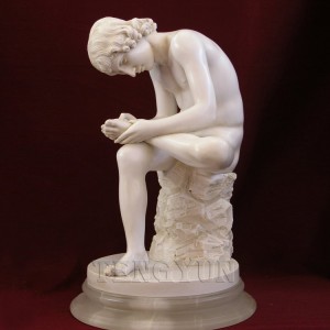 Marble statue boy with thorn