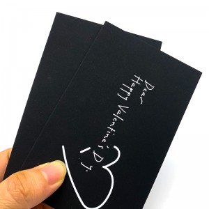 Hochwertige Grußkarte aus schwarzem, dickem Papier mit weißen Buchstaben. Dankeskarte an den Kunden